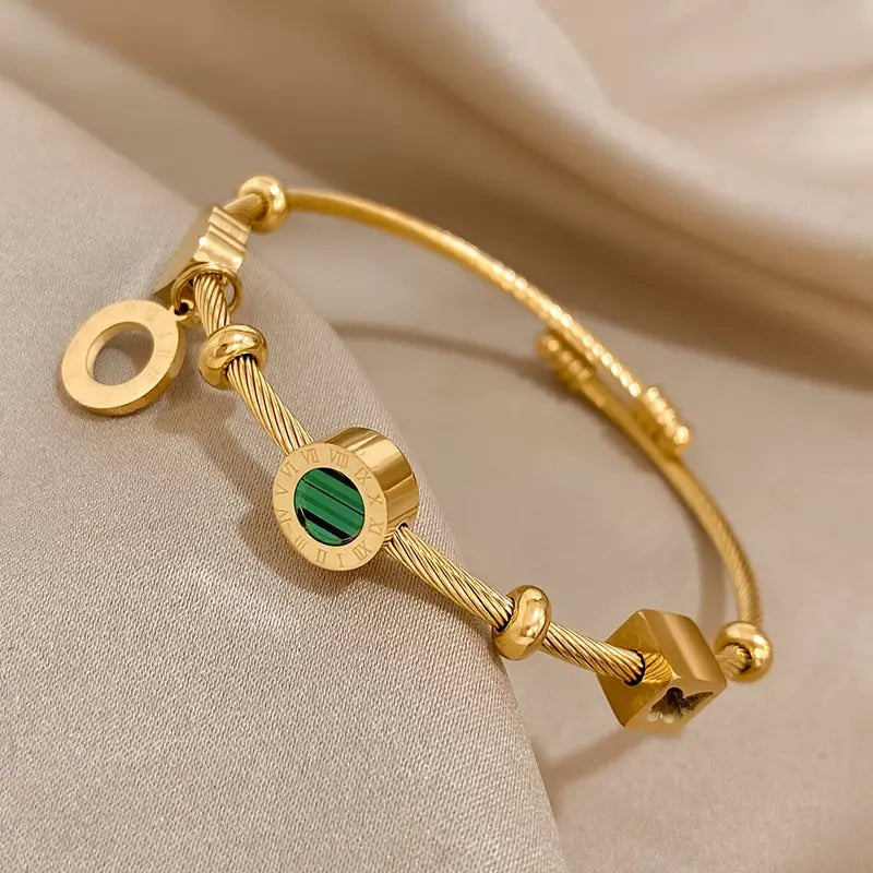 Aurelia – Emerald Charm Gold Bracelet